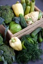Vegetable basket. Fresh vegetables on the table black background. Set of food delivery box. Broccoli, cabbage, eggplant Royalty Free Stock Photo