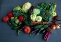 Vegetable basket. Fresh vegetables on the table black background. Set of food delivery box. Broccoli, cabbage, eggplant Royalty Free Stock Photo