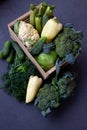 Vegetable basket. Fresh vegetables on the table black background. Set of food delivery box. Broccoli, cabbage, eggplant Royalty Free Stock Photo