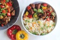 Vegetable Carrot Fried Rice with Indian spices served along with chilly chicken Royalty Free Stock Photo