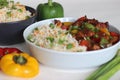 Vegetable Carrot Fried Rice with Indian spices served along with chilly chicken Royalty Free Stock Photo