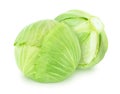 Vegetable composition with whole fresh cabbage isolated on a white background. Royalty Free Stock Photo