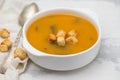 Vegetable cream soup with dry bread in white bowl Royalty Free Stock Photo