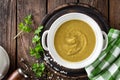 Vegetable cream soup, puree on wooden rustic table Royalty Free Stock Photo
