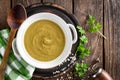 Vegetable cream soup, puree on wooden rustic table Royalty Free Stock Photo