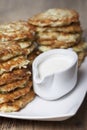 Vegetable fritters of zucchini with parsley and dill closeup . Royalty Free Stock Photo