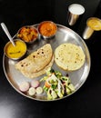 Vegetable Gujarati kathiyawadi thali on table, Indian thali meal Royalty Free Stock Photo