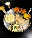 Vegetable Gujarati kathiyawadi thali on table, Indian thali meal Royalty Free Stock Photo