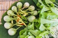 Vegetable on leaf and bamboo blind floor