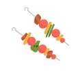 Vegetable and meat kebab on skewer. Grilled BBQ food with veggies and pork. Roasted cherry tomatoes, asparagus, broccoli