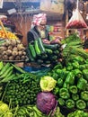 Vegetable merchant in Dhaka, Bangladesh