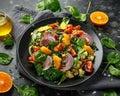 Vegetable Millet salad with red onion, cherry tomatoes, spinach, tangerine and clementine dressing. healthy food