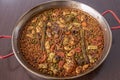 Vegetable paella with socarrat, wild asparagus, cauliflower, green beans, Royalty Free Stock Photo