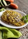 Vegetable pancakes with zucchini, carrot, chia, flax seeds and oatmeal Royalty Free Stock Photo