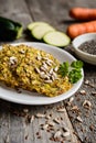 Vegetable pancakes with zucchini, carrot, chia, flax seeds and oatmeal Royalty Free Stock Photo