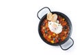 Vegetable pisto manchego with tomatoes, zucchini, peppers, onions,eggplant and egg, served in frying pan isolated on white