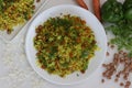 Vegetable Poha is a quick breakfast or snack made of beaten rice or flattened rice along peanuts, carrots and chilies Royalty Free Stock Photo