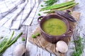 Vegetable pureed soup with asparagus and green peas topped with fresh dill Royalty Free Stock Photo