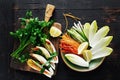 Vegetable roll dark wooden table top view Vegetable snacks Royalty Free Stock Photo