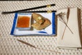 Vegetable rolls on porcelain platter with chopsticks