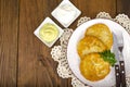 Vegetable rosti, golden fried potato pancakes with dips from cauliflower and sour cream