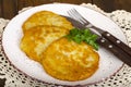 Vegetable rosti, golden fried potato pancakes with dips from cauliflower and sour cream