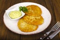 Vegetable rosti, golden fried potato pancakes with dips from cauliflower and sour cream