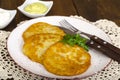 Vegetable rosti, golden fried potato pancakes with dips from cauliflower and sour cream