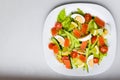 Vegetable salad. Baked eggplant salad and fresh tomatoes. View from above. natural products