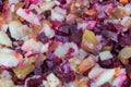 Vegetable salad with beets, carrots, onions and potatoes close up