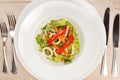 Vegetable salad with calamari