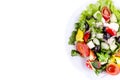 Vegetable salad cucumbers pepper cheese olives on a white plate Royalty Free Stock Photo