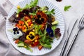 Vegetable salad with edible flowers Royalty Free Stock Photo