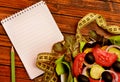 Vegetable salad with empty notebook Royalty Free Stock Photo