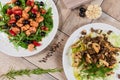 Vegetable Salad. Gray plate. Wooden light background. Free space for text. Salad of cucumbers, tomato and cabbage. Royalty Free Stock Photo