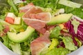 Vegetable salad with lettuce, avocado and jamon, fragment close-up Royalty Free Stock Photo