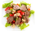 Vegetable salad with mashrooms and meat isolated