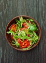 Vegetable salad over dark wood background Royalty Free Stock Photo