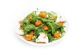 Vegetable salad with pumpkin, arugula and blue cheese on a white background Royalty Free Stock Photo