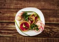 Vegetable salad with radish, cucumber, green onions and greens Royalty Free Stock Photo