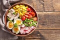 Vegetable salad with radish, egg, mushroom, corn and tomato Royalty Free Stock Photo