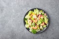 Vegetable salad with shrimp, sesame seeds, iceberg lettuce, romaine and radicchio salad