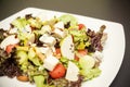 Vegetable salad on white plate Royalty Free Stock Photo