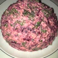 A russian beetroot salade with eggs, cheese and mayonnaise