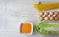 Vegetable set of spaghetti products, cabbage, a tray of chicken eggs and lentils. Copy space. Food donation Royalty Free Stock Photo