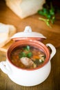 Vegetable soup with beans and meatballs in a ceramic bowl Royalty Free Stock Photo