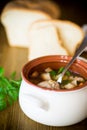 Vegetable soup with beans and meatballs in a ceramic bowl Royalty Free Stock Photo