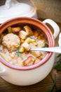 Vegetable soup with beans and meatballs in a ceramic bowl Royalty Free Stock Photo