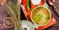 Vegetable soup, broth with noodles, herbs, parsley and vegetables in bowl with sour cream Royalty Free Stock Photo