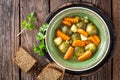 Vegetable soup with brussel sprouts on wooden rustic table Royalty Free Stock Photo